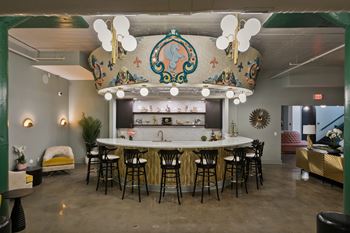 Bar seating under decorative crown feature